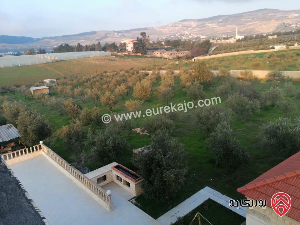 مزرعة مساحة البناء 500م على أرض 13 دونم و 553م للبيع في موبص لواء عين الباشا 