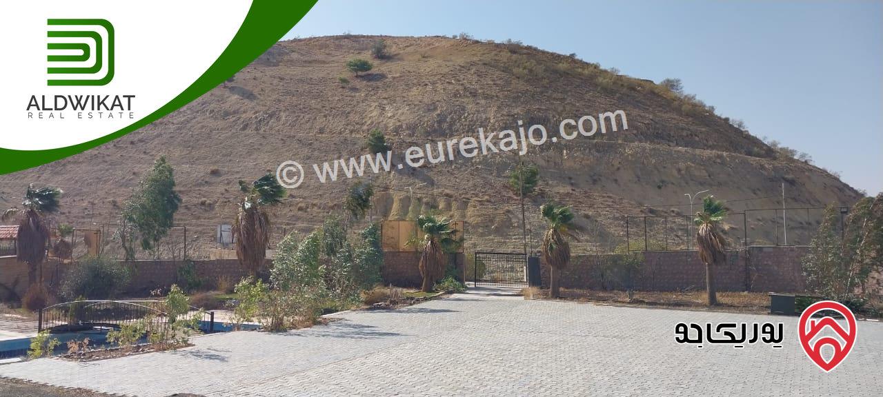 مشروع سياحي استثماري للبيع في ناعور / شارع البحر الميت مساحة الارض4650م والبناء 1000م موقع اطلالة مميز تصلح لمشروع استثماري