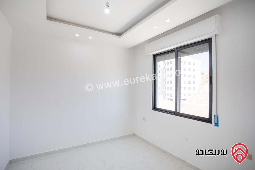 شقة طابق ثالث مع روف مساحة 170م للبيع بسعر 65 الف في عمان - ابو علندا قرب دوار البنزين 