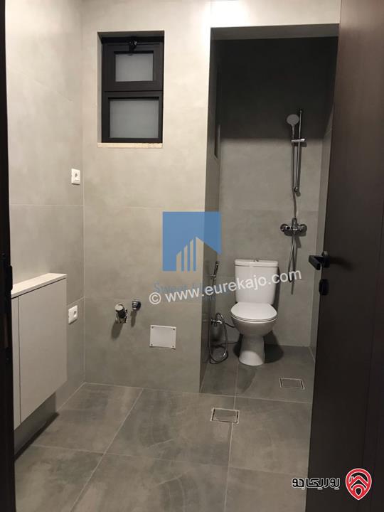 شقة طابقية فاخرة طابق اول مساحة 235م للبيع في عمان - الجندويل تشطيب سوبر ديلوكس لم تسكن