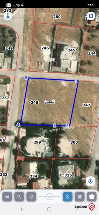 قطعة ارض مساحة 1 دونم و 796م للبيع في اربد - الحصن الاصبح 