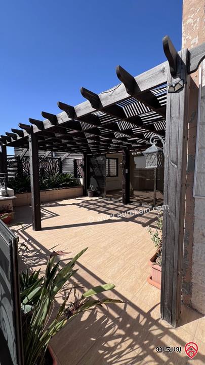 شقة طابق أخير مع روف مساحة 280م باطلالة خلابة للبيع في عمان - ضاحية النخيل من المالك مباشرة 