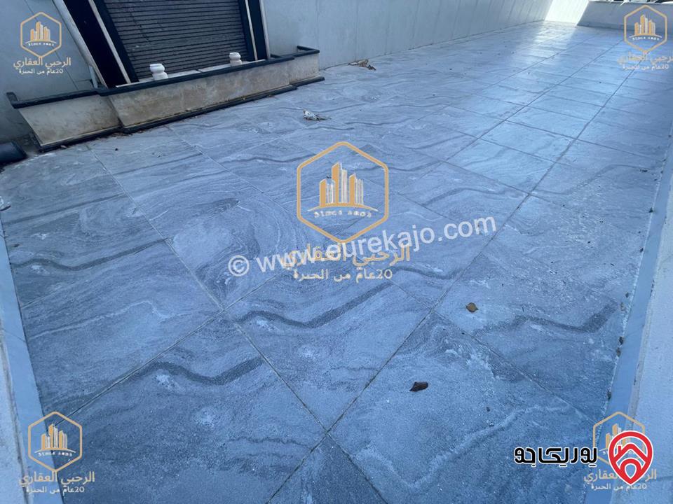 شقة ارضية مساحة 145م مع ترس خارجي 135م للايجار في عمان - الجندويل