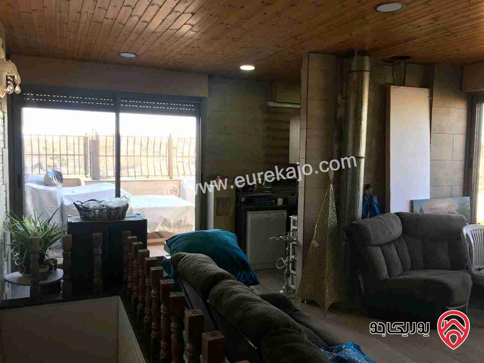 شقة فاخرة طابق ثالث مع روف مساحة 224م للبيع في عمان - ش المطار في مرج الحمام حي الظهير خلف مدارس الرهبات 