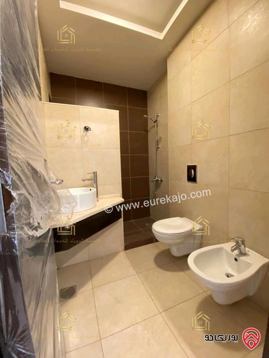 شقة جديدة لم تسكن طابق ارضي مساحة 200م مع ترس 40م للإيجار في عمان - خلدا 