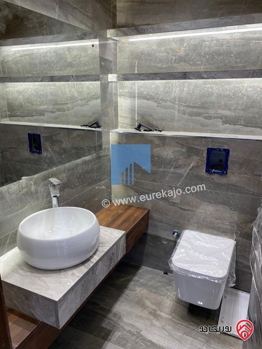 شقة أرضية فاخرة للبيع في عمان - أم أذينة قرب أبراج السادس 200م مع ترس 60م لم تسكن