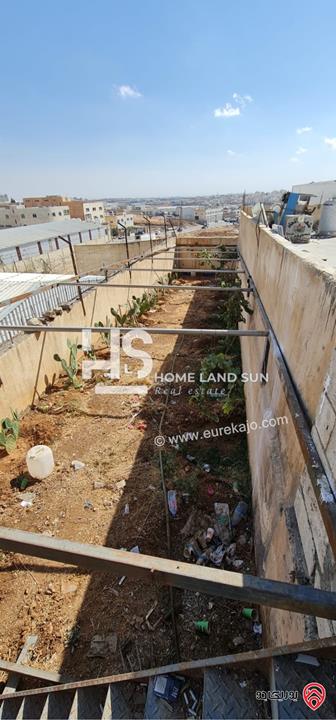 مجمع تجاري على أرض 1552م للبيع في عمان - ابو علندا ب دخل سنوي 26000 دينار