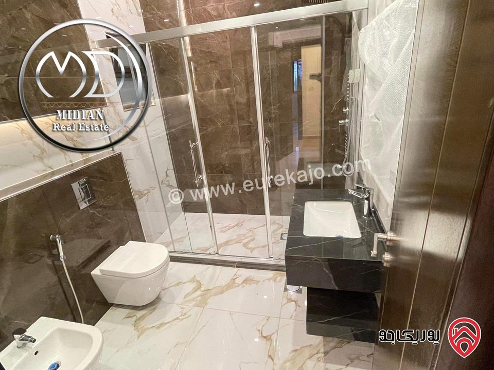 شقة شبه ارضي جديدة للبيع في عمان - ام السماق قرب الستي مول مساحة 160م مع ترس و حديقة 120م تشطيبات ديكورات فاخرة