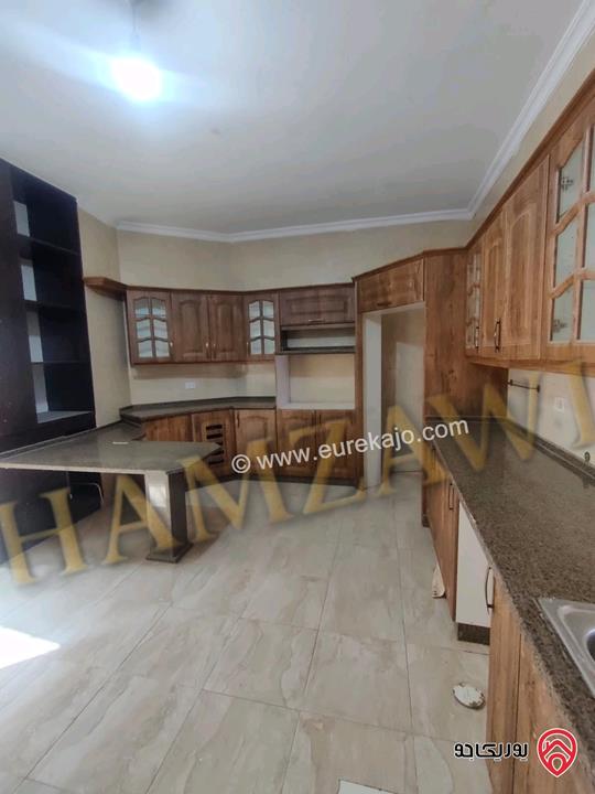 شقة ارضية مساحة 180م داخلي و 50م خارجي للايجار في عمان - ضاحية النخيل 