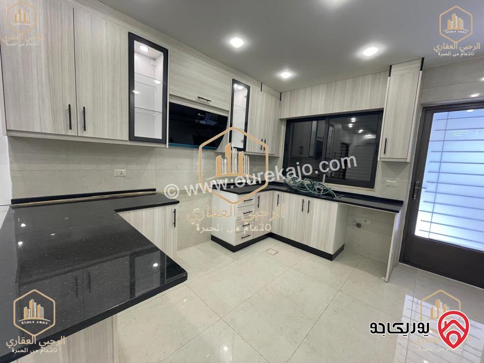 شقة ارضية جديدة مساحة 150م داخلي و 50م خارجي للايجار في عمان - الجندويل 