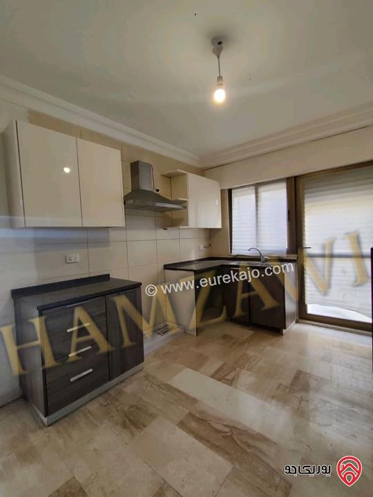 شقة فارغة طابق ارضي مساحة 100م داخلي و 120م خارجي للإيجار في عمان - عبدون 