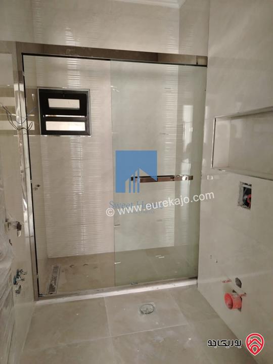 شقة فاخرة للبيع في عمان - خلدا قرب المدارس الإنجليزية طابق ثالث 280م مع روف دوبلكس 180م لم تسكن