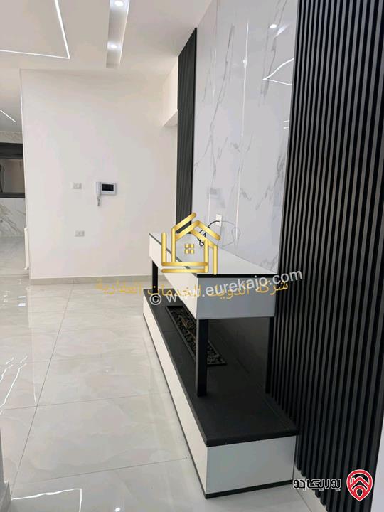 شقة جديدة لم تسكن طابق ارضي مساحة 160م داخلي و 100م خارجي للايجار في عمان - طريق المطار 