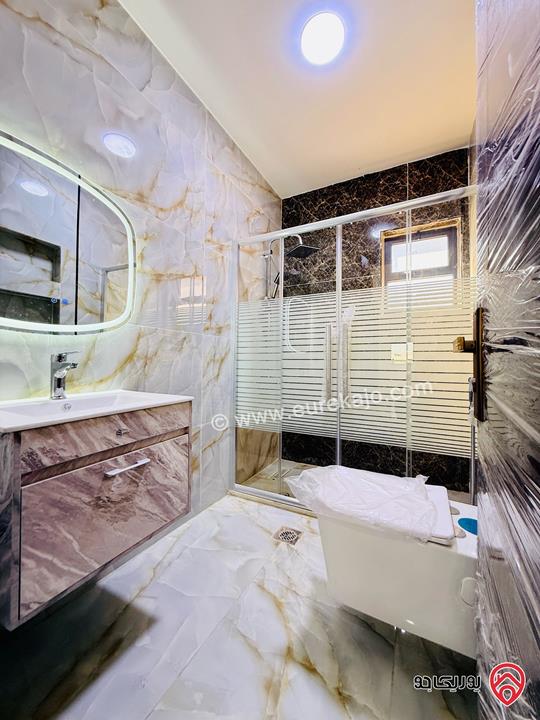 شقة طابق اخير مع روف مساحة 230م للبيع في عمان - شفا بدران اقساط 