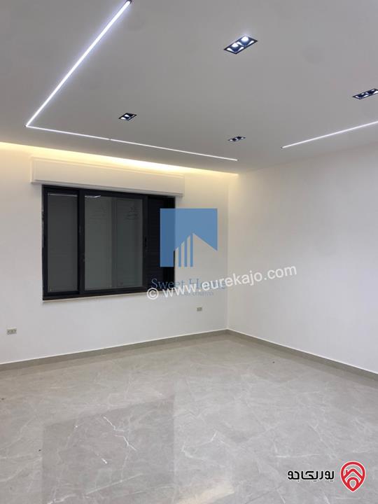 شقة أرضية فاخرة للبيع في عمان - أم أذينة قرب أبراج السادس 190م مع ترسات 130م لم تسكن