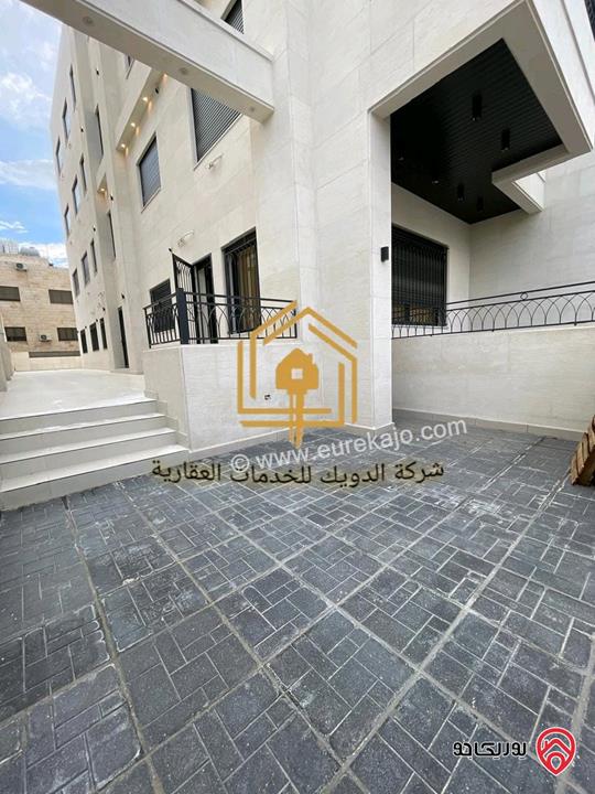 شقة جديدة طابق أرضي مساحة 165م داخلي و 180م خارجي للايجار في عمان - حي الصحابة 