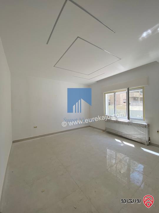 شقة أرضية فاخرة للبيع في عمان خلدا - قرب إشارة البنك العربي 175م مع ترسات 200م لم تسكن