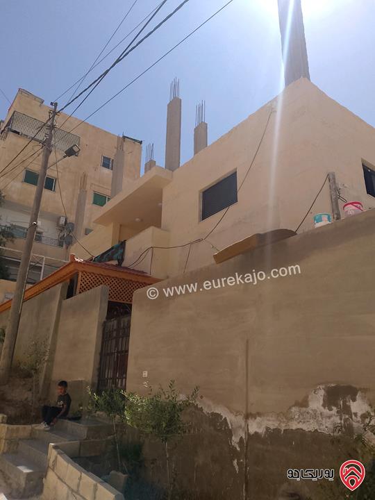 بيت مساحة 186م على أرض 309م للبيع في عمان - اسكان صالحية العابد البيت ع درج وليس شارع 