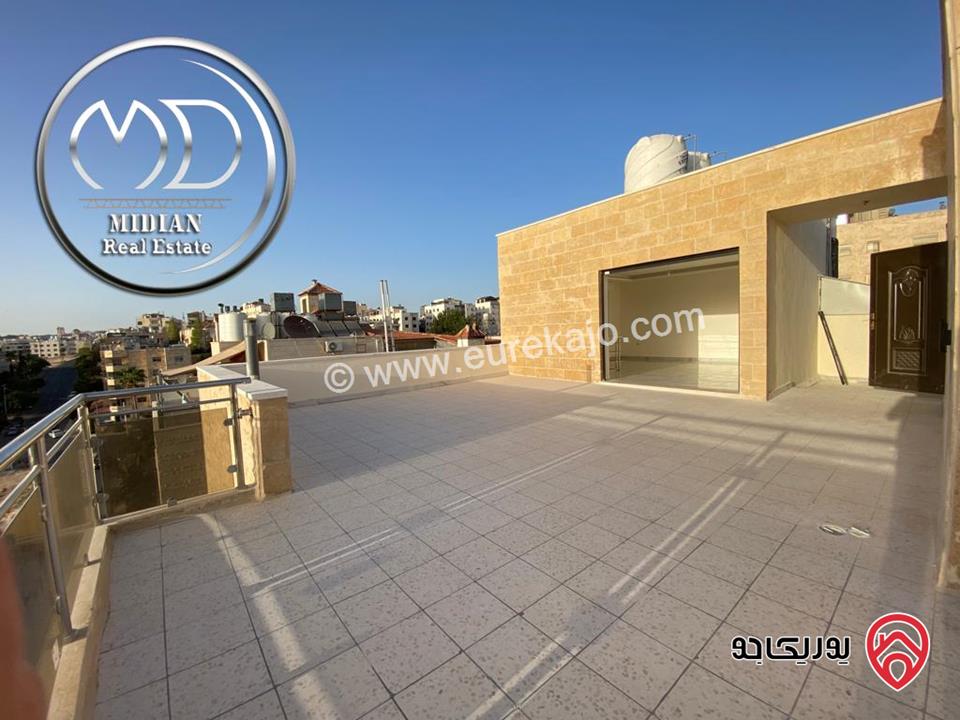 شقة دوبلكس جديدة طابق اخير مع روف للبيع في عمان - ام السماق قرب السيتي مول مساحة 300م مع تراسات اطلالة رائعة