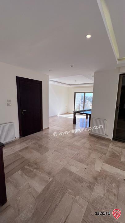 شقة طابق أخير مع روف مساحة 280م باطلالة خلابة للبيع في عمان - ضاحية النخيل من المالك مباشرة 