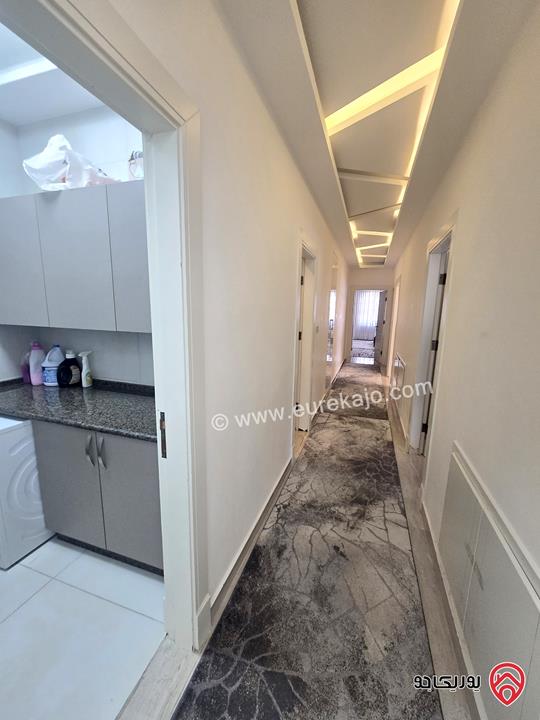 شقة مفروشة بالكامل طابق اخير مع رووف مساحة 250م للبيع في عمان - خلدا