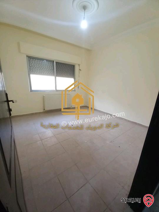 شقة فارغة طابق اول مساحة 110م للإيجار في عمان - ام السماق 