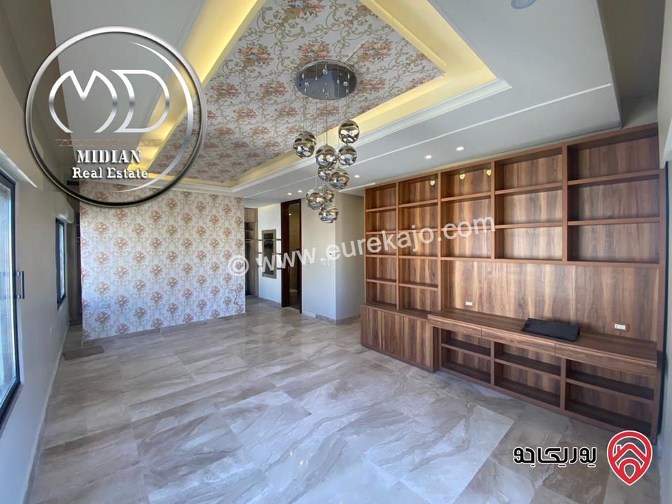 شقة للبيع طابق أخير مع روف في عمان - خلدا - العوجانية مساحة 425م مع تراسات تشطيبات ديكورات فاخرة اطلالة بانورامية خلابة 