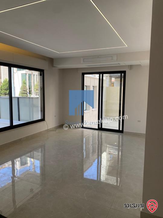 شقة أرضية فاخرة للبيع في عمان - أم أذينة قرب أبراج السادس 190م مع ترسات 130م لم تسكن