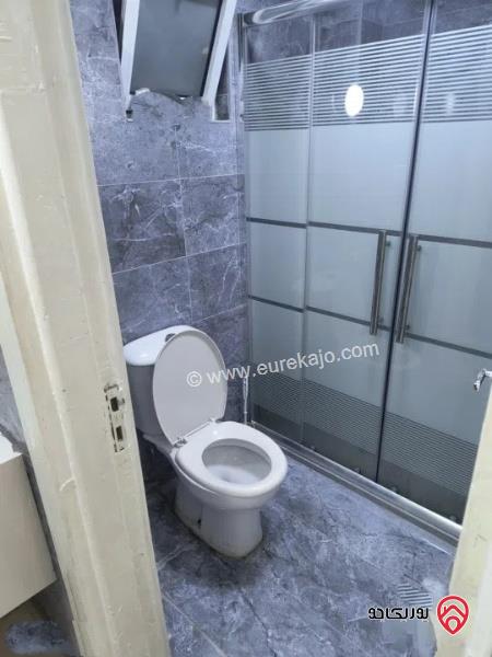 شقة طابق ارضي مساحة 100م + 50م ترس للايجار في عمان - جبل الحسين 