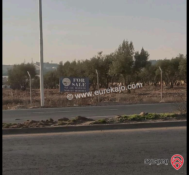 قطعة أرض تجارية مساحة 1 دونم و 79م للبيع في عمان - على شارع اليادودة باتجاه جسر مادبا