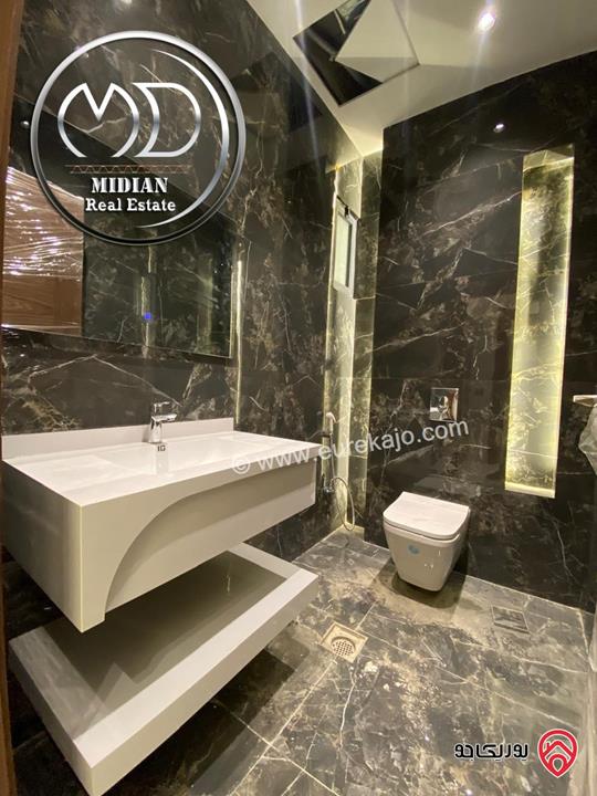 شقة شبه ارضي جديدة للبيع في عمان - جبل عمان مساحة 240م مع ترس و حديقة 200م تشطيبات ديكورات عصرية فاخرة بسعر مميز