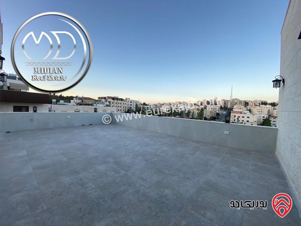 شقة دوبلكس طابق اخير مع روف للبيع في عمان - خلدا مساحة 275م تشطيبات سوبر ديلوكس اطلالة جميلة امكانية الأقساط