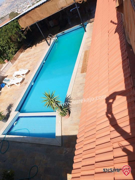 مزرعة مساحة الأرض 2 دونم و 500م والبناء 250م للبيع من أراضي شمال عمان - موبص