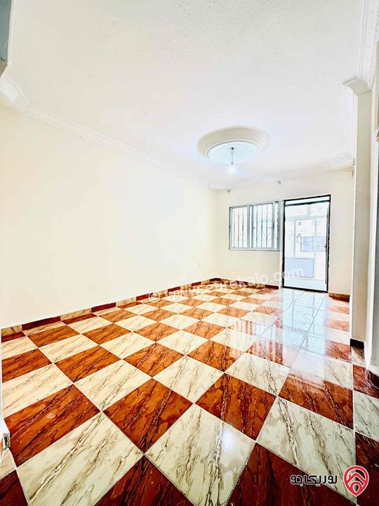 شقة شبه ارضية مساحة 120م داخلي و 100م خارجي للبيع في عمان - طبربور 