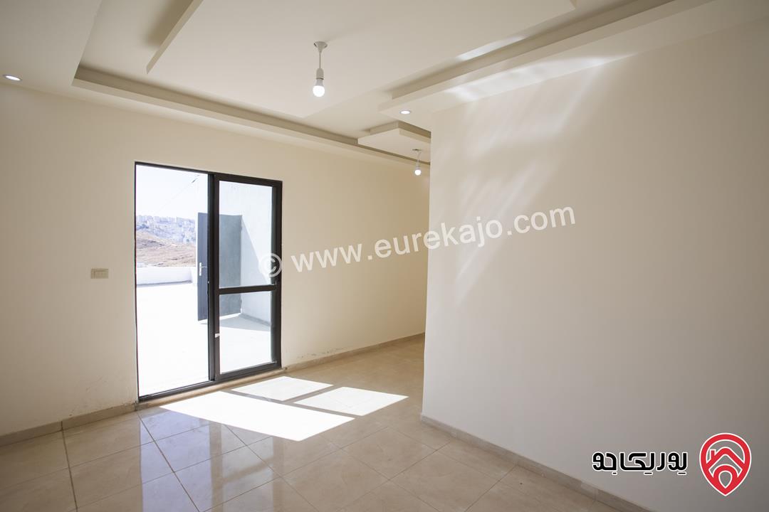 شقة طابق ثالث مع روف مساحة 135م للبيع في عمان - ابو علندا اطلالة بانوراما