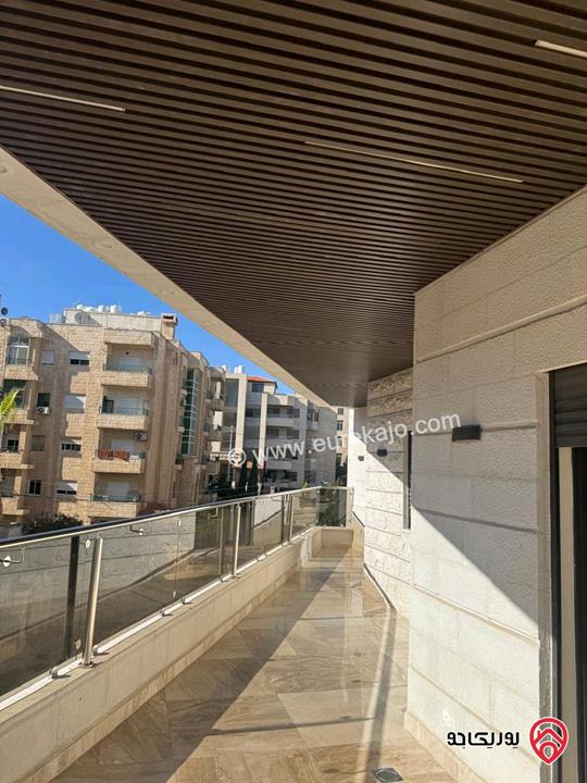 شقة طابق ثاني مساحة 215م للبيع في عمان - الرابية