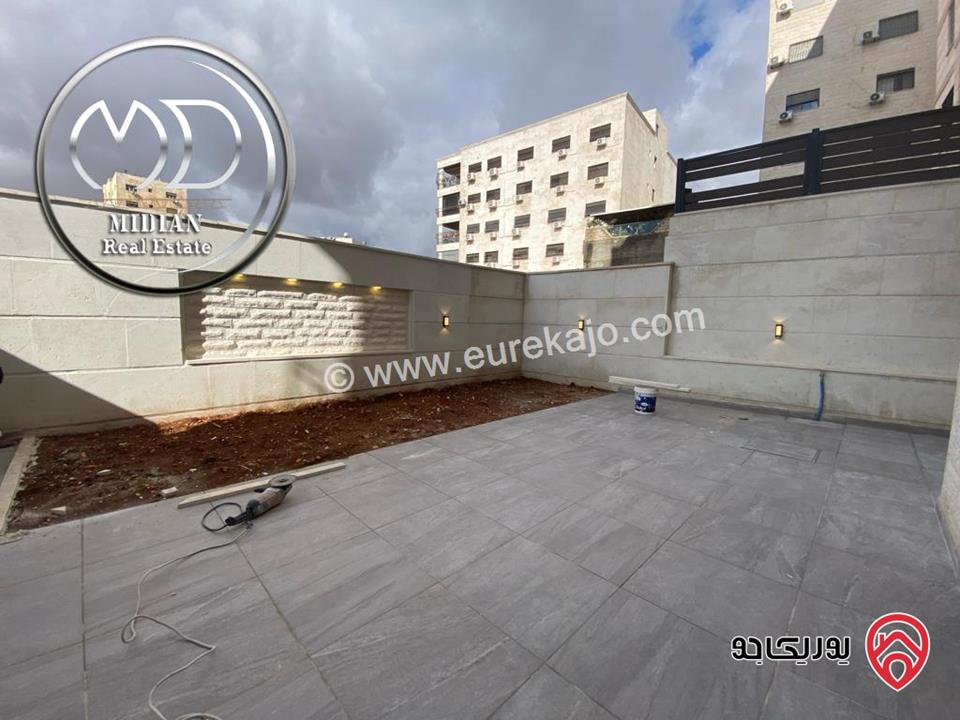 شقة شبه ارضي جديدة للبيع في عمان - الجندويل مساحة 180م مع ترس و حديقة 100م تشطيبات و ديكورات فاخرة بسعر مميز جداً