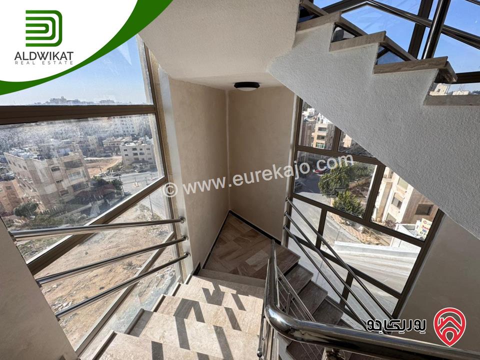 شقة طابقية مع روف للبيع في عمان - تلاع العلي مساحة البناء 260م ومساحة الترس 70م على شارعين