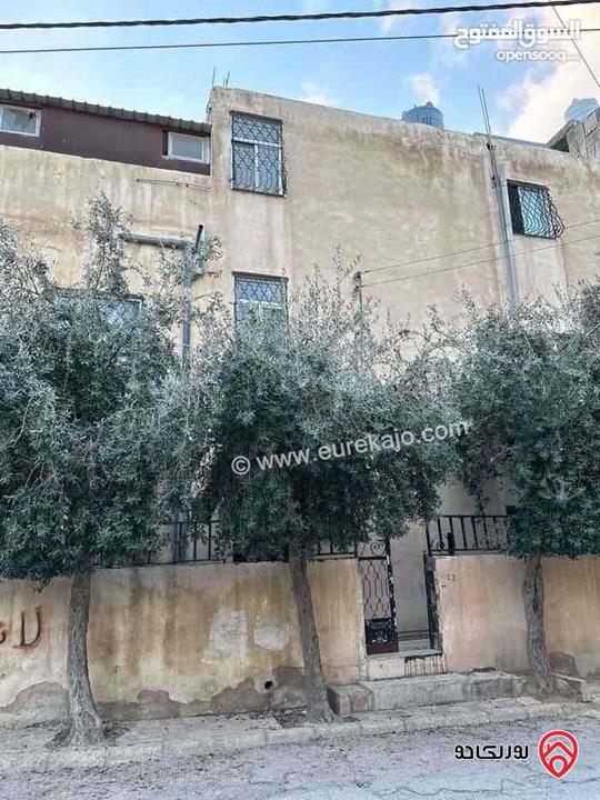 بناية سكنية من شقتين ونصف صالحة مؤجرة على ارض 250م للبيع وصالحة للاستثمار في عمان - أم نوارة