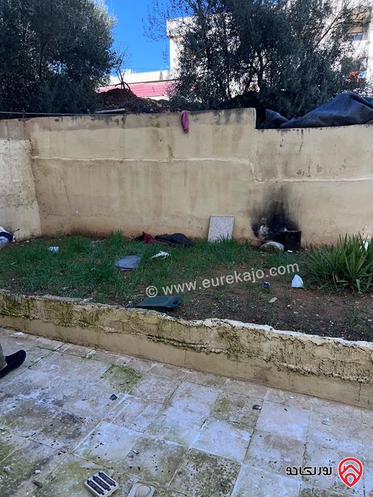 شقة شبه أرضية مساحة 100م داخلي و 100م خارجي للبيع في عمان - الجبيهة 