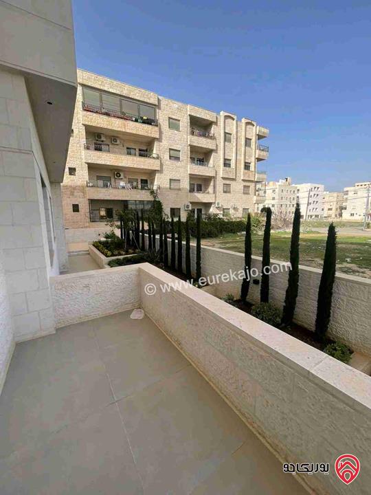 شقة ارضية مساحة 260م داخلي و 200م خارجي للبيع في اربد