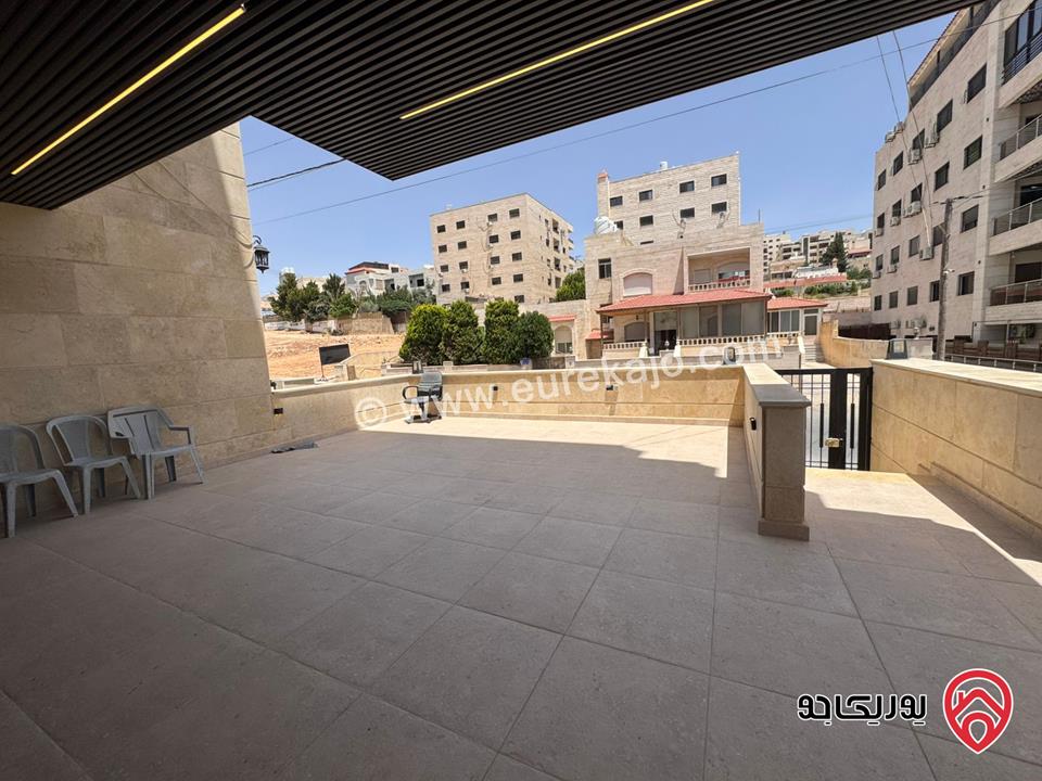 شقة للبيع في عمان - مرج الحمام / طريق المطار طابق ارضي مساحة البناء 230م ومساحة الترس 30