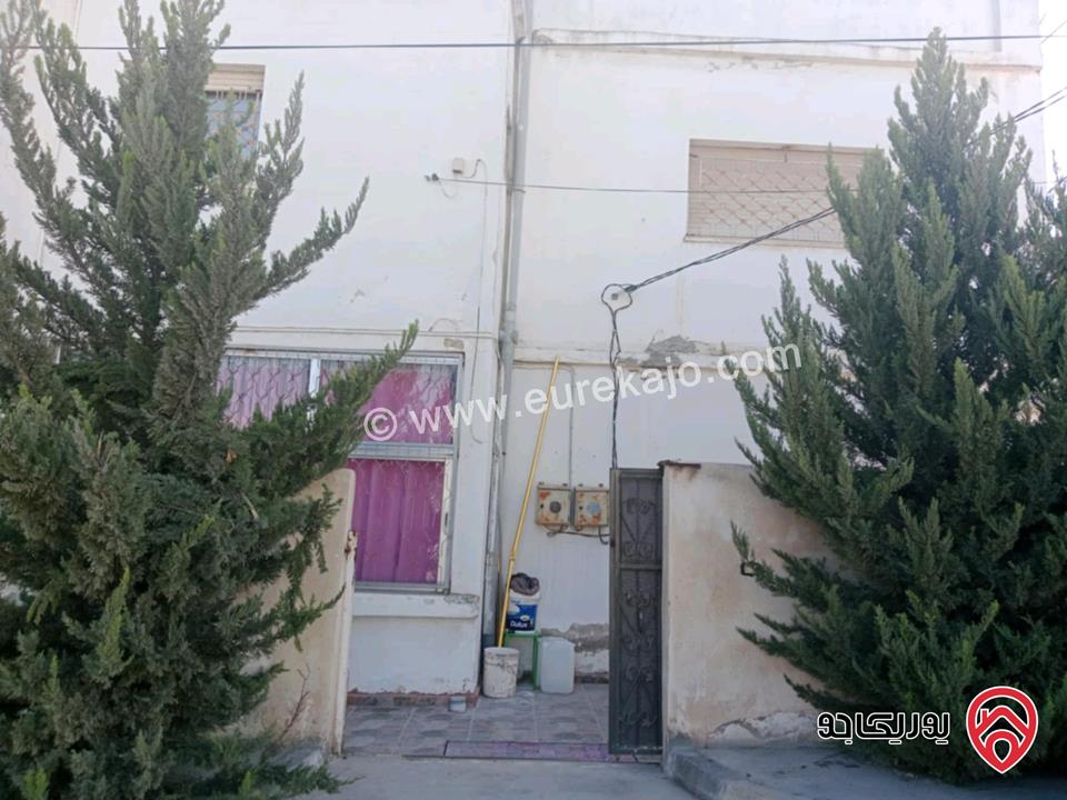 منزل طابقين + مستودع على أرض 446م للبيع في اربد - الحصن