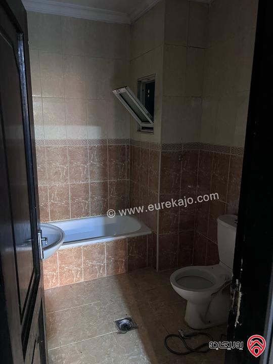 شقة شبه أرضية مساحة 100م داخلي و 100م خارجي للبيع في عمان - الجبيهة 