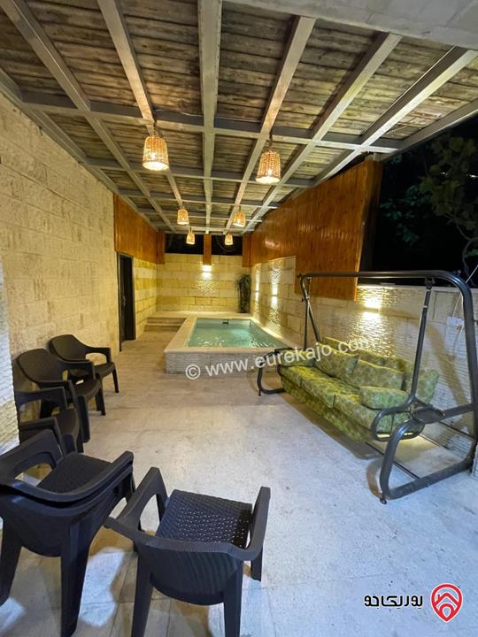 شقة مفروشة طابق ارضي مساحة 100م داخلي و 40م خارجي للايجار في عمان - الجندويل