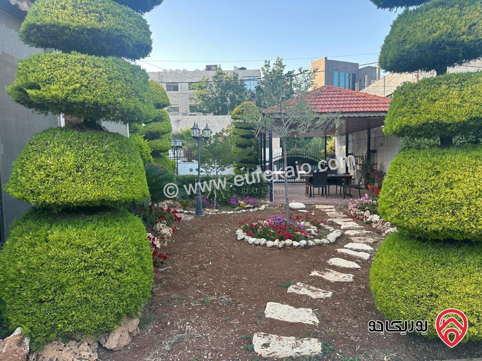 أرض سكنية مساحة 840م عليها منزل 217م للبيع في عمان - الجندويل