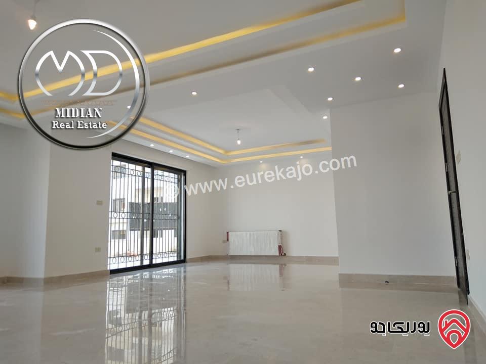 شقة ارضية جديدة للبيع في عمان - ضاحية النخيل مساحة 250م مع ترس و حديقة 150م تشطيبات و ديكورات سوبر ديلوكس