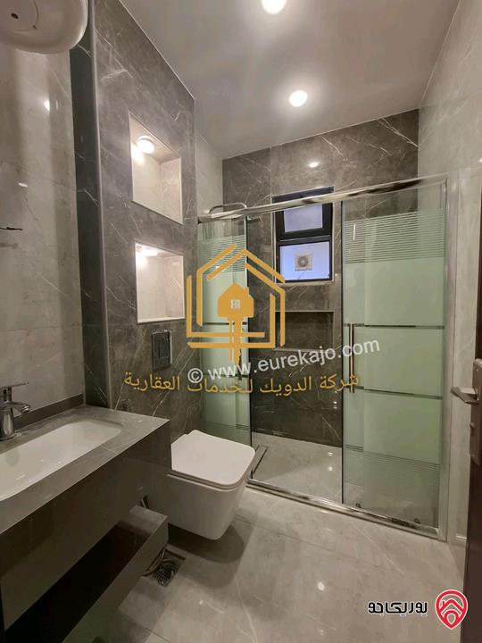 شقة جديدة طابق أرضي مع حديقة مساحه 150م داخلي 130م حديقة للايجار في عمان - الجندويل 