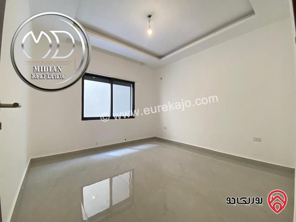 شقة شبه ارضي جديدة للبيع في عمان - تلاع العلي مساحة 200م مع ترس و حديقة 150م تشطيبات سوبر ديلوكس بسعر مميز جداً