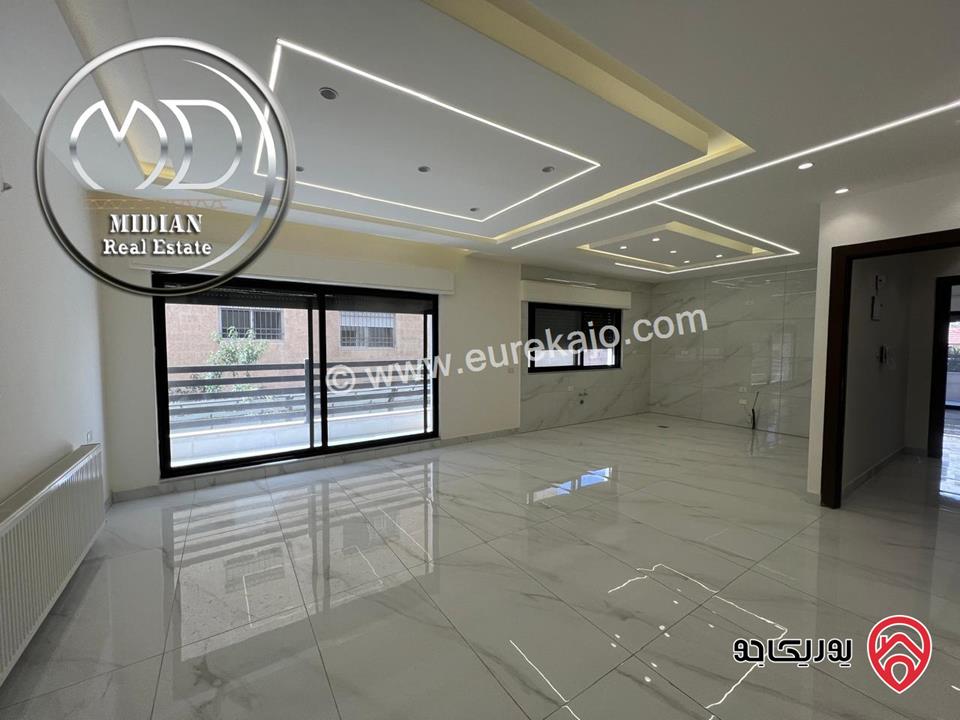 شقة ارضية جديدة للبيع في عمان - ضاحية الرشيد مساحة 185م مع ترس 40م تشطيبات ديكورات سوبر ديلوكس بسعر مميز جداً